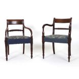 A harlequin pair of late 18th/ early 19th century mahogany carvers with reeded arms and turned back