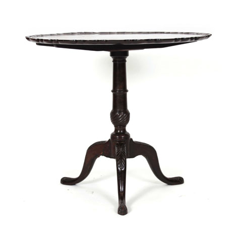 An 18th century and later mahogany tilt-top table,