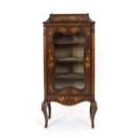 An Edwardian walnut, marquetry and gilt metal mounted music cabinet,