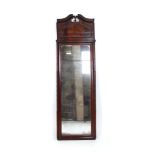 A 19th century mahogany pier mirror with an architectural pediment and turned pilasters,