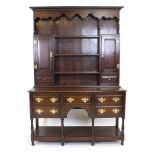 An 18th century and later oak dresser,