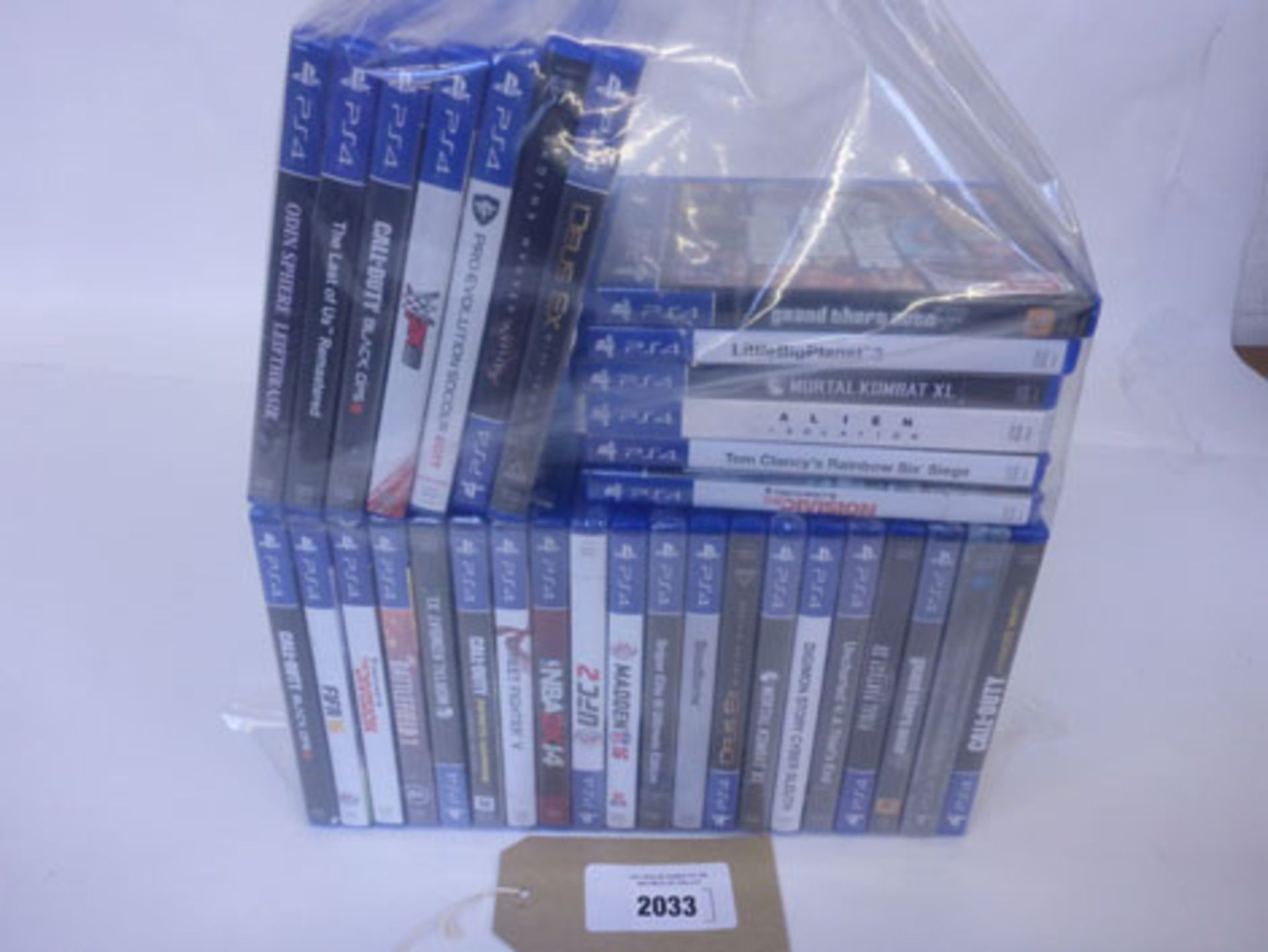 Bag containing 30 plus PS4 games