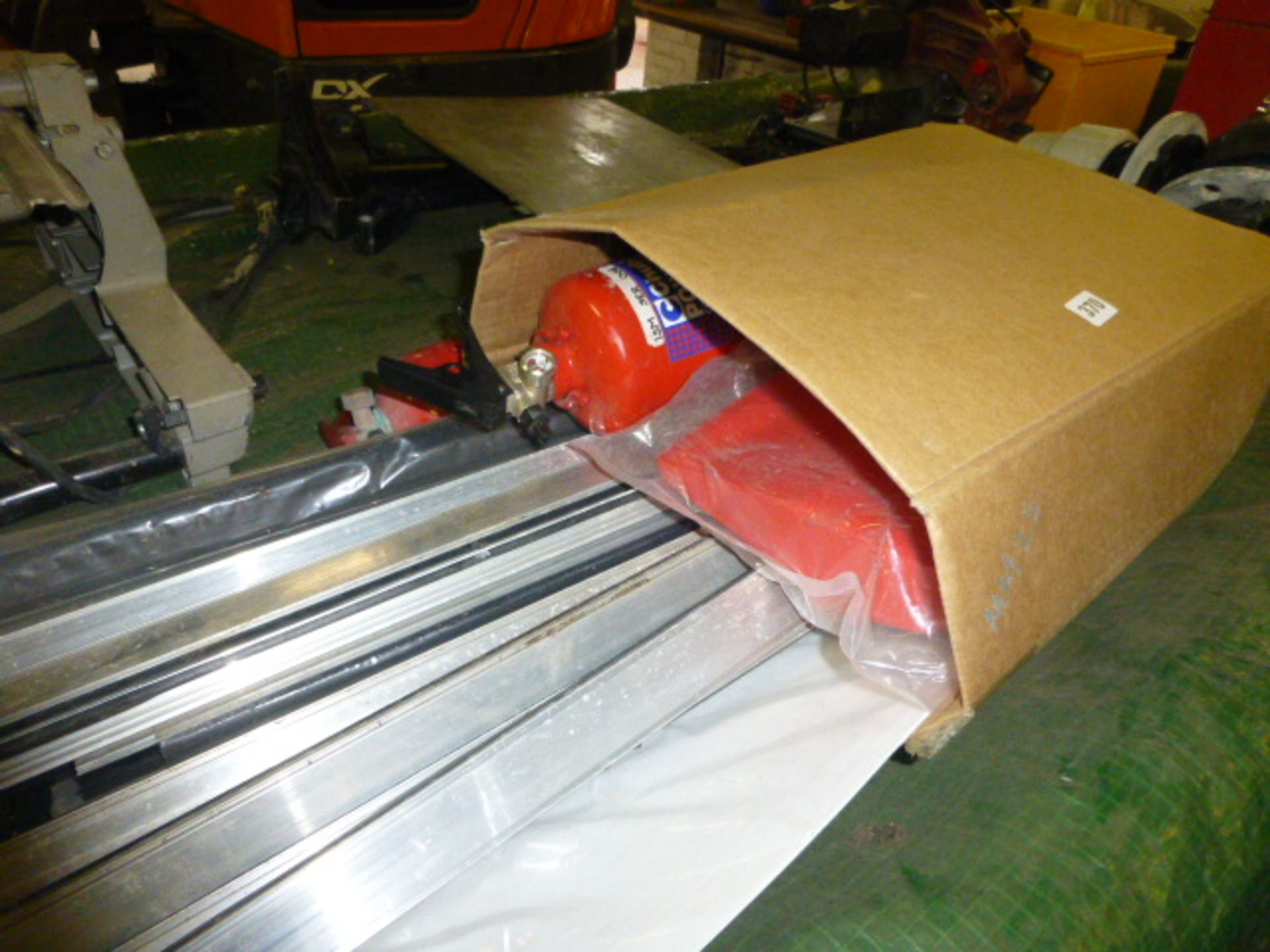 Tray of fire extinguishers, aluminium glazing strips, signage etc.