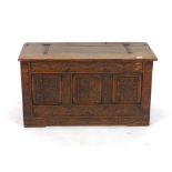 An 18th century and later oak and metal bound coffer,
