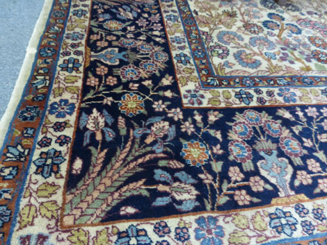 A mid-20th century Persian silk rug,