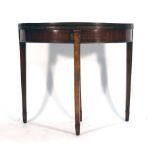 A George III mahogany demi-lune tea table on square tapering legs, w.