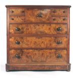 A Victorian figured walnut chest with an arrangement of one square drawer,