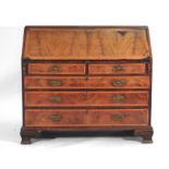 A 19th century walnut and mahogany bureau,