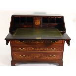 A Sheraton-type mahogany, marquetry and brass mounted bureau,