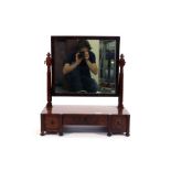 A 19th century mahogany dressing table mirror, the rectangular plate over three drawers on bun feet,