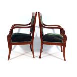 A pair of late 19th century Scandinavian mahogany and upholstered armchairs,