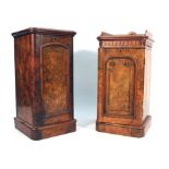 A pair of Victorian walnut pot cupboards with solid doors and plinth bases CONDITION