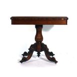 A 19th century rosewood card table, the folding top on a turned column and four splayed legs, w.