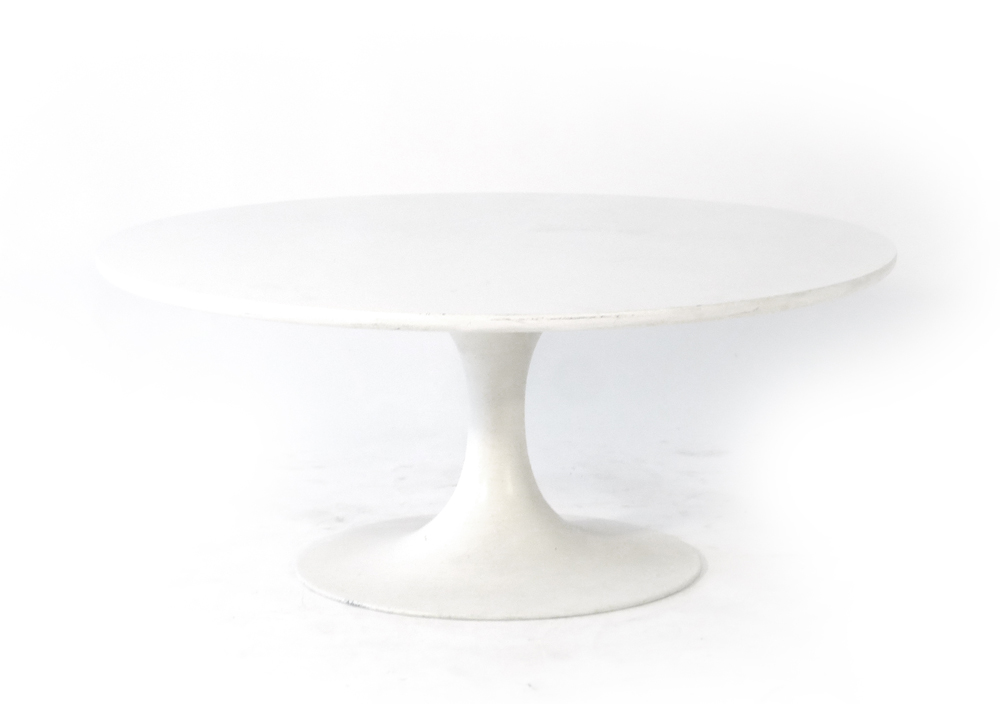 An Arkana white circular coffee table on a cast metal base, d.