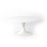 An Arkana white circular coffee table on a cast metal base, d.