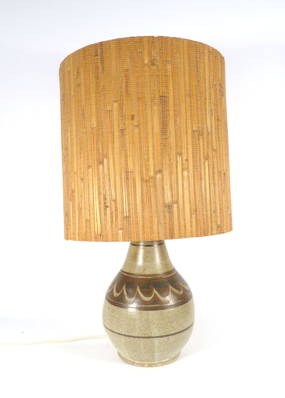 A studio pottery lamp base decorated with brown glazes, h.