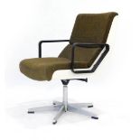 A 1960's office armchair with a fibreglass shell on a five star base