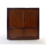 A Dyrlund Cherrywood cabinet with two pairs of tambour doors on castors, w.