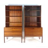 A pair of rosewood bookcase cabinets, one with glazed sliding doors,