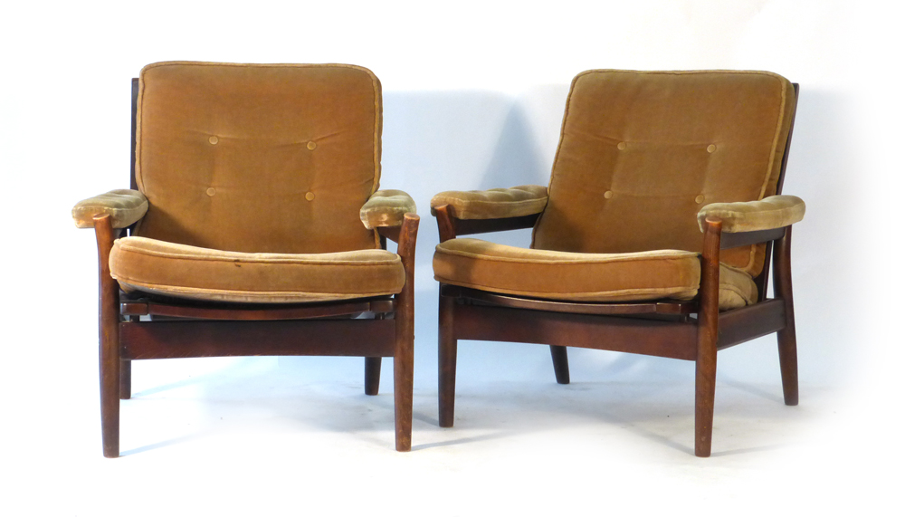 A pair of 1970's stained beech and button upholstered lounge armchairs CONDITION