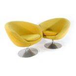 A pair of Ryman Contracting yellow upholstered tub chairs on swivel bases CONDITION
