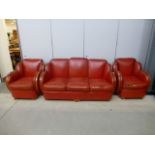 An Art Deco red leather three piece suite