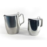 A pair of graudated stainless steel jugs by Afra Alessi, max. h.