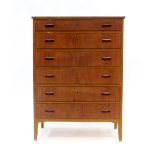 A 1960's teak chest of six drawers on square feet, w.