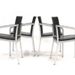 A set of six Thonet black leather and steel framed stacking office armchairs
