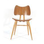 An Ercol elm and beech 'Butterfly' chair CONDITION REPORT: Structurally sound,