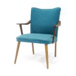 A 1960's turquoise upholstered cocktail chair with beech arms CONDITION REPORT: