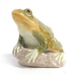 A Lladro paperweight modelled as a seated frog, h.