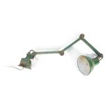 A 1950/60's green enameled three branch adjustable desk-clamped work lamp