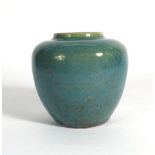 A modern Chinese stoneware vase of ovoid form decorated in a plain pale green glaze, h. 10.