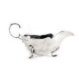 An Edwardian silver sauce boat of traditional form, E S Barnsley & Co.