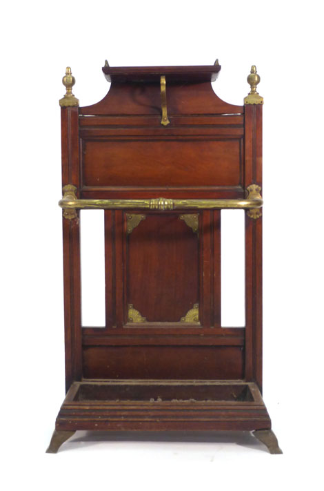 A late 19th century mahogany and brass mounted four compartment umbrella and stick stand attributed