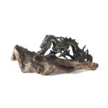 A Chinese brown patinated bronze figure modelled as an outstretched dragon, l.