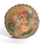 A Chinese drum of circular form decorated with dragons, d.