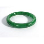 A green jade bangle, internal d. 6.