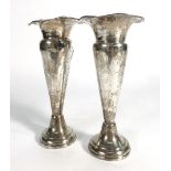 A pair of silver spill vases, makers mark indistinct, Birmingham 1929, h.