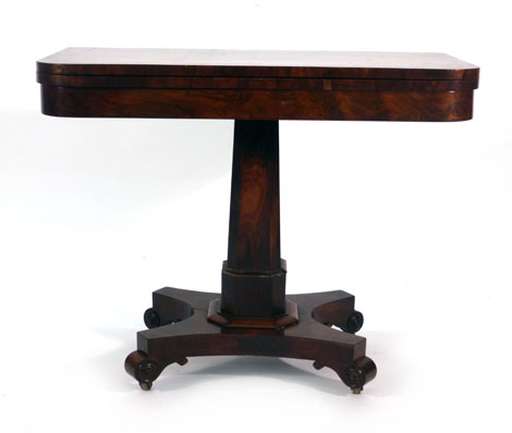 A William IV rosewood and crossbanded card table on a turned column,