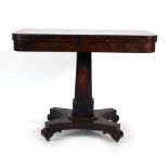 A William IV rosewood and crossbanded card table on a turned column,