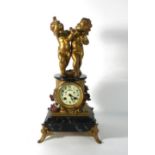 A 19th century French clock, the movement marked AD Mougin and striking on a bell,