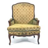 A Louis XV-style beech and upholstered saloon armchair on cabriole feet CONDITION REPORT: