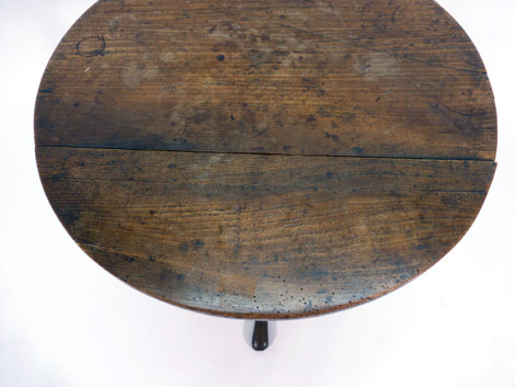 A George III elm tilt-top table, the circular top over a turned column and tripod base, d. - Image 2 of 2