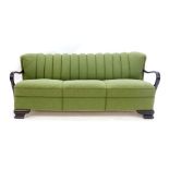 A 1940's sage green upholstered sofa,