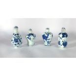 A group of four Chinese blue and white snuff bottles, max h.