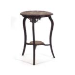 An early 20th century carved hardwood occasional table on cabriole legs, d.
