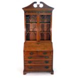 A reproduction yew bureau bookcase,