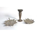 Two Middle Eastern metalware filigree work dishes of leaf shaped form and a similar spill vase (3)